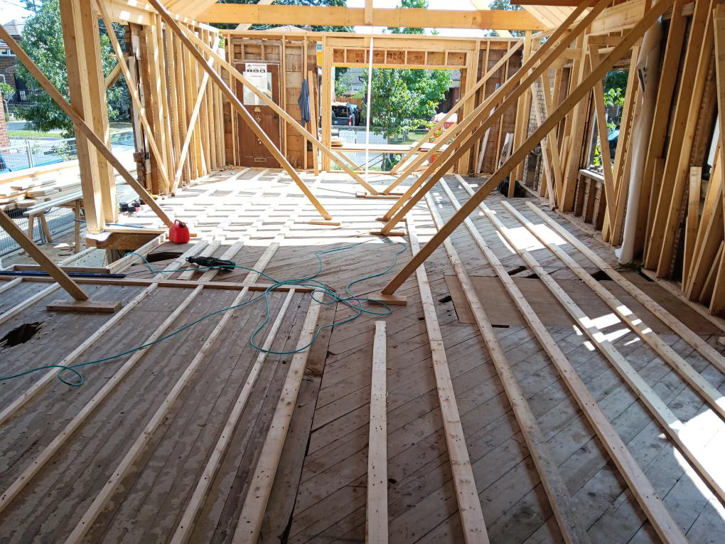 Interior floor framing, stud walls and temporary braces